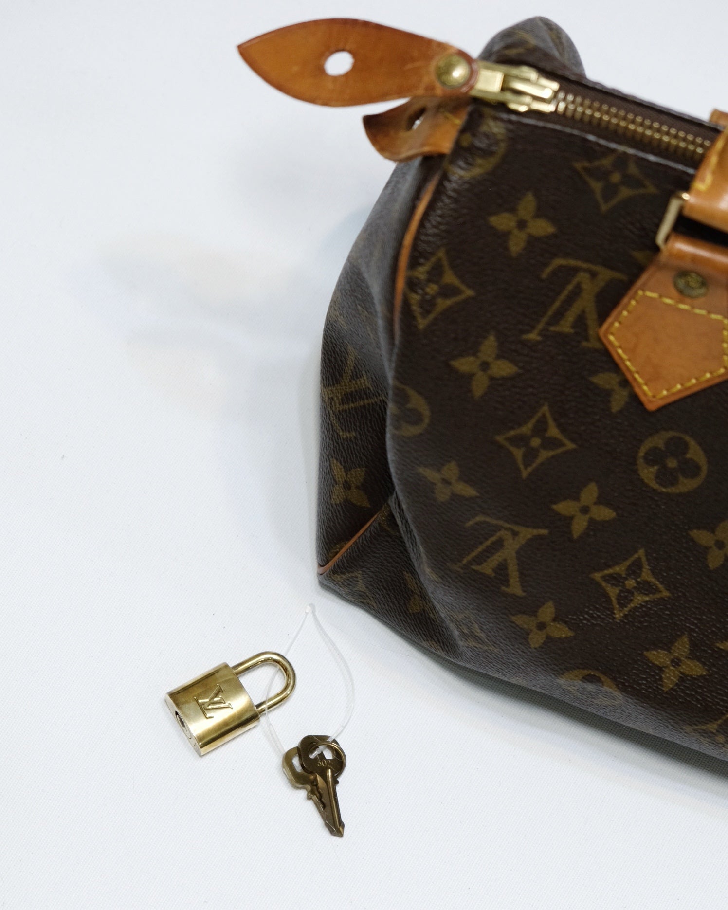 Louis Vuitton Monogram Speedy 25 with Lock and Keys