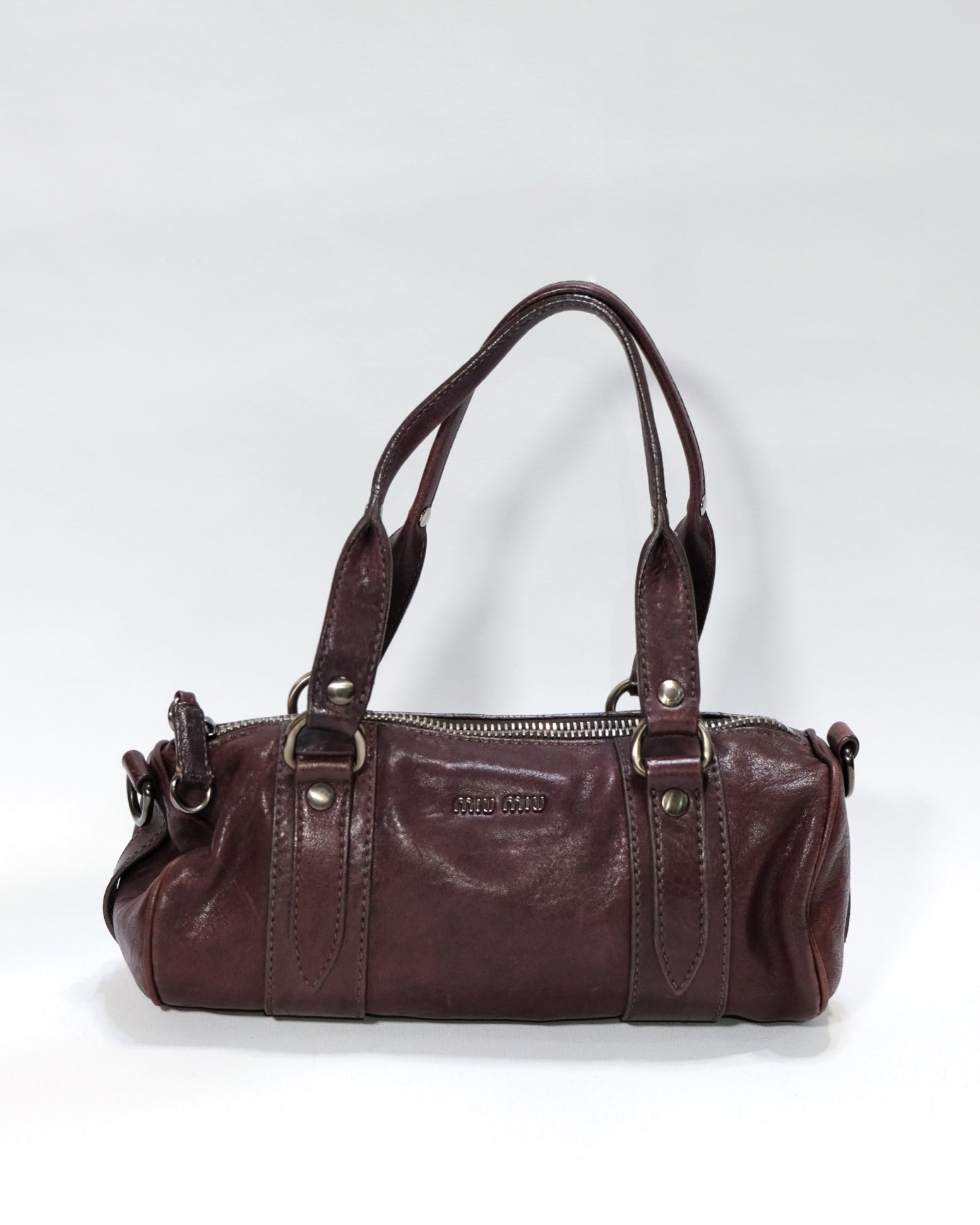 Miu Miu Copper Leather Barrel Bag By Miuccia Prada