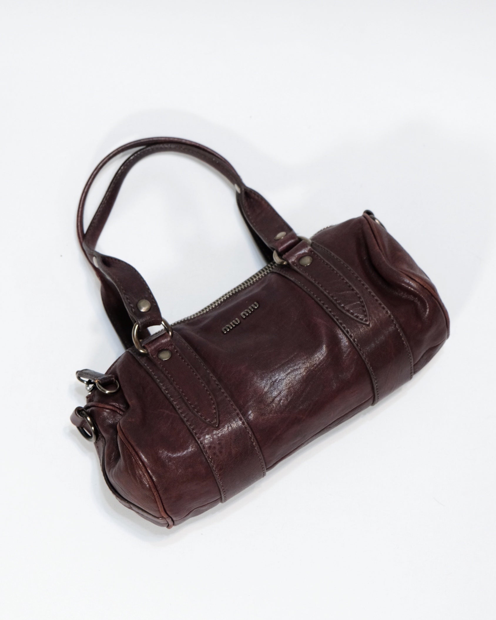 Miu Miu Copper Leather Barrel Bag By Miuccia Prada